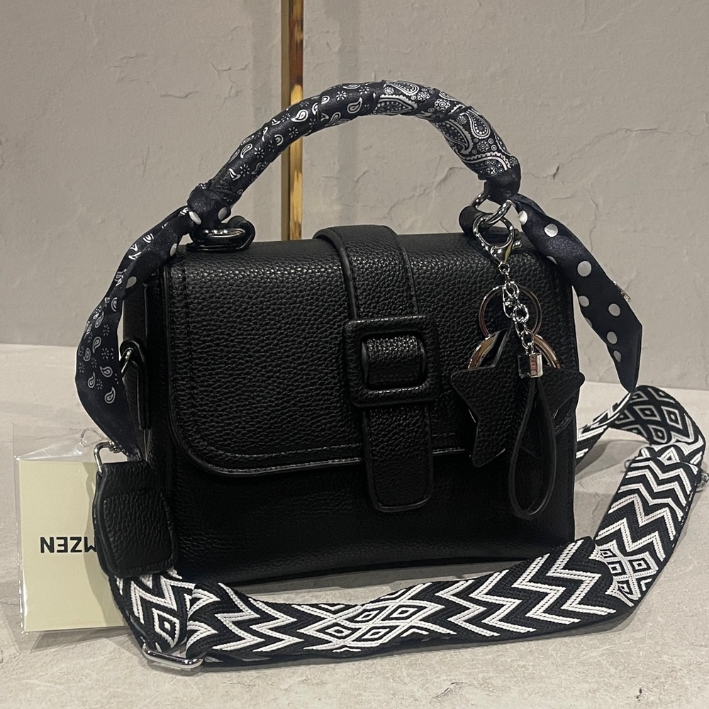 Elegant Black Crossbody Bag with Patterned Strap